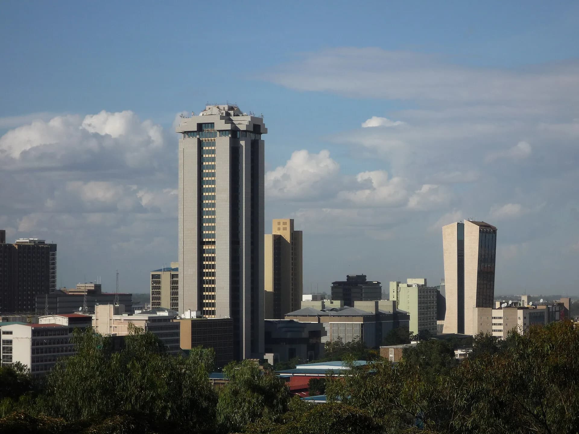 Nairobi city skyline with office towers under a blue sky
